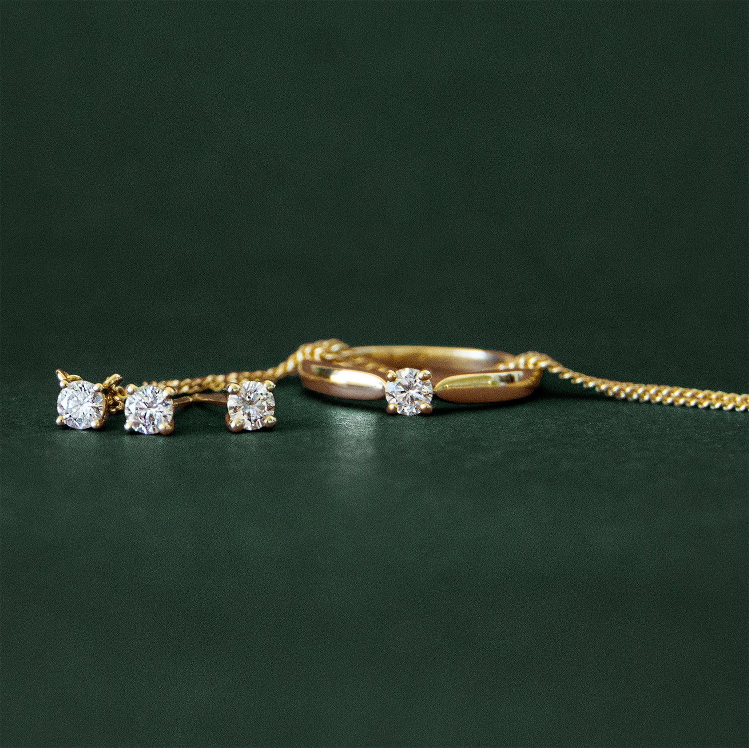 classic diamond set of stud earrings, solitaire necklace, and ring - solid gold jewellery made in Australia