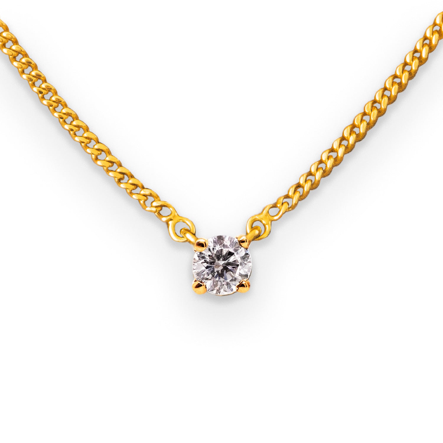 0.25ct diamond prong set solid gold pendant on diamond cut curb chain