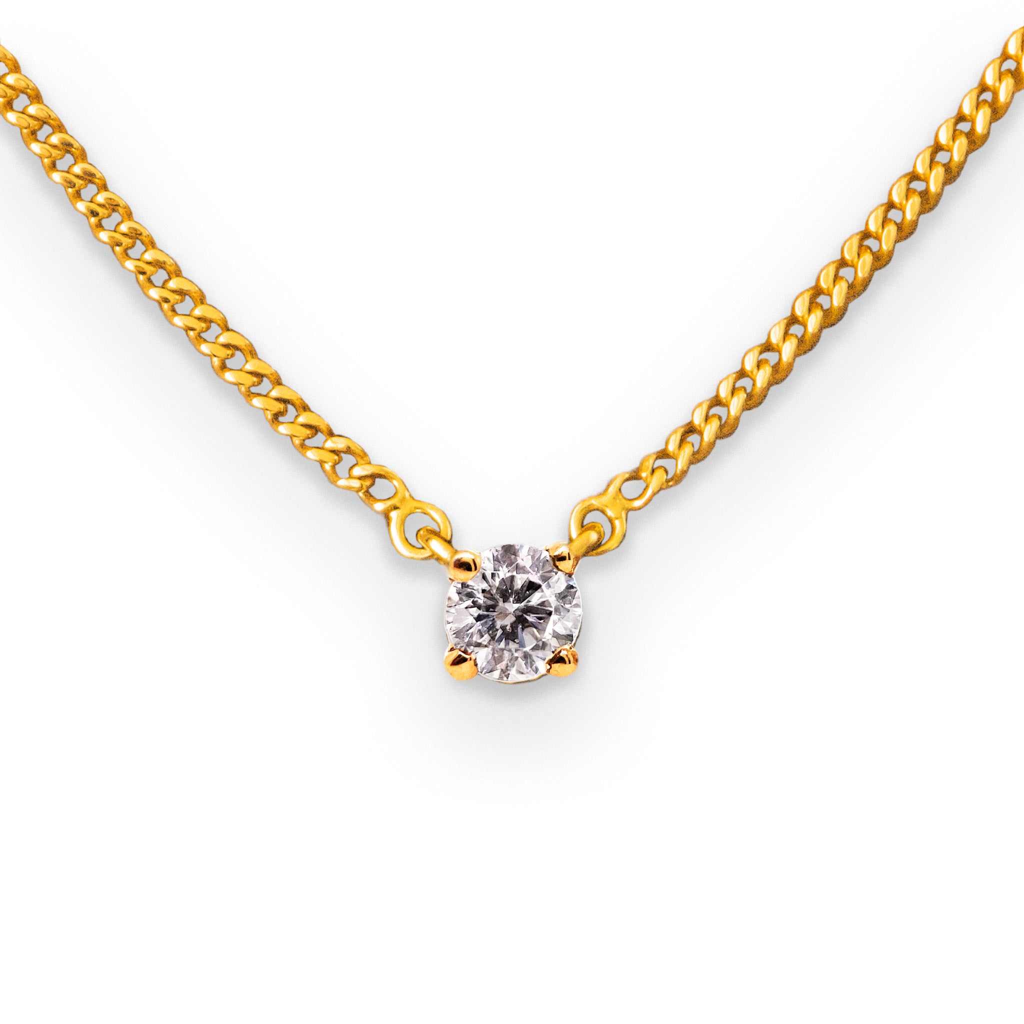 0.25ct diamond prong set solid gold pendant on diamond cut curb chain