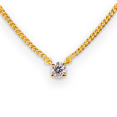 0.25ct diamond prong set solid gold pendant on diamond cut curb chain