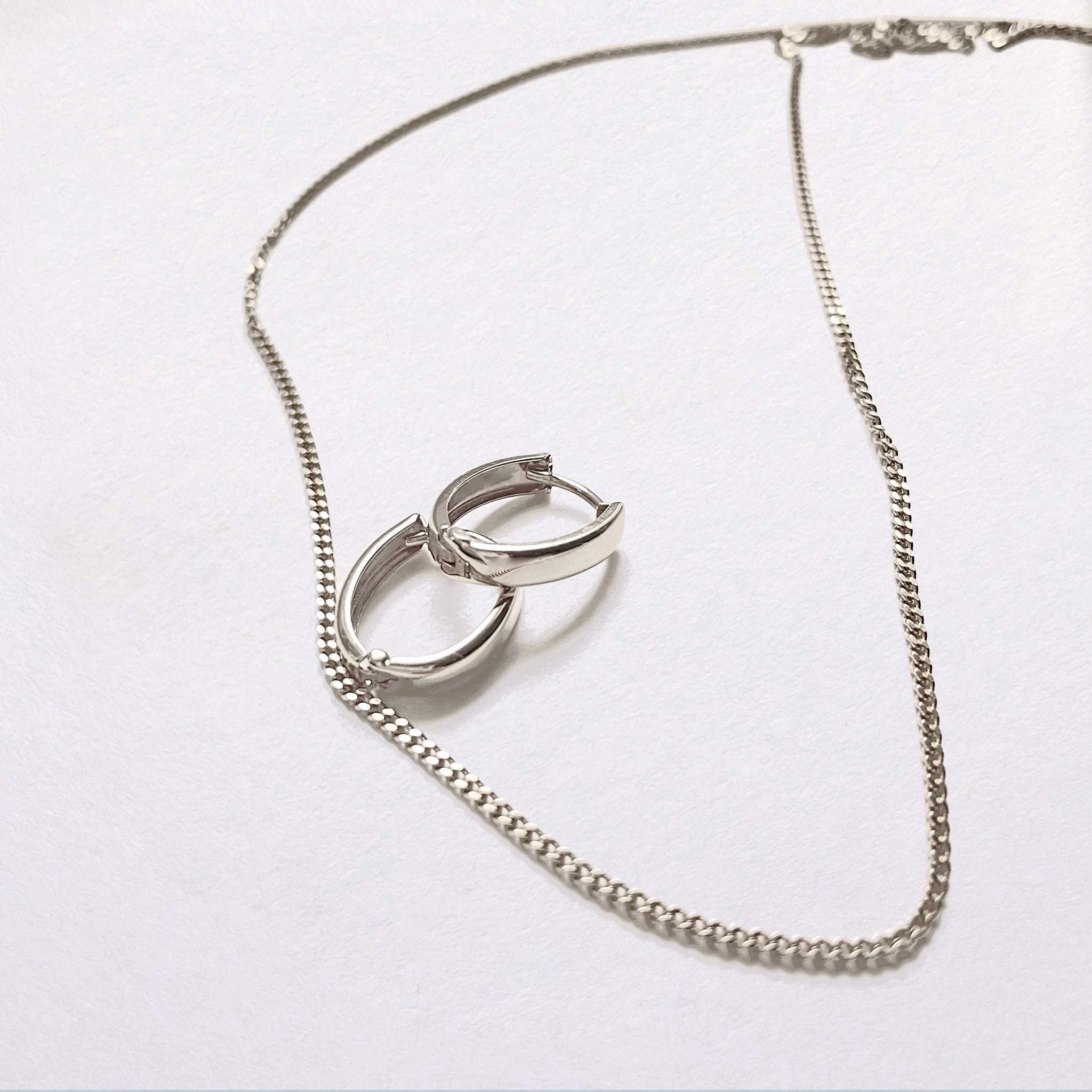 Huggie Hoops - White Gold