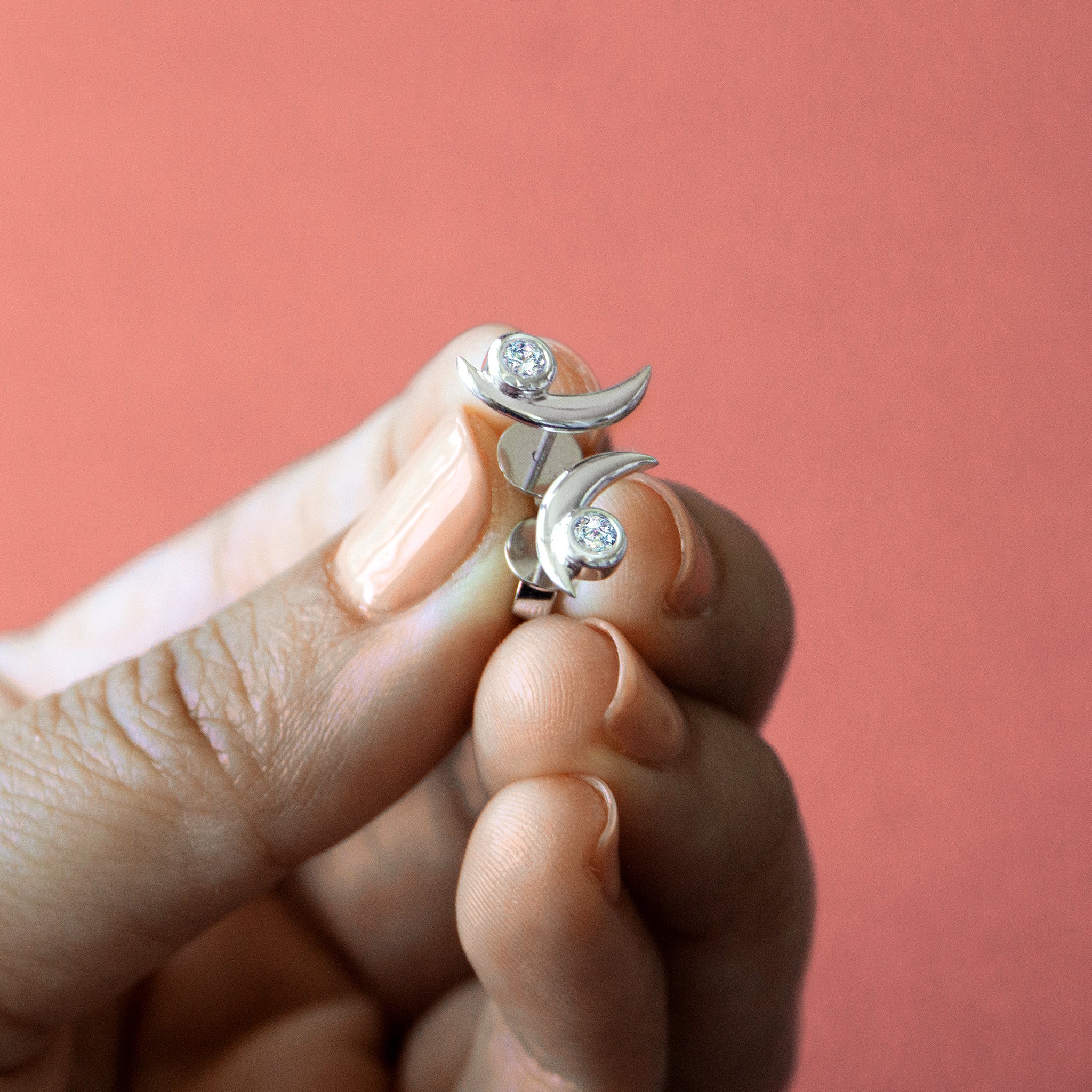 solid gold and diamond crescent earrings