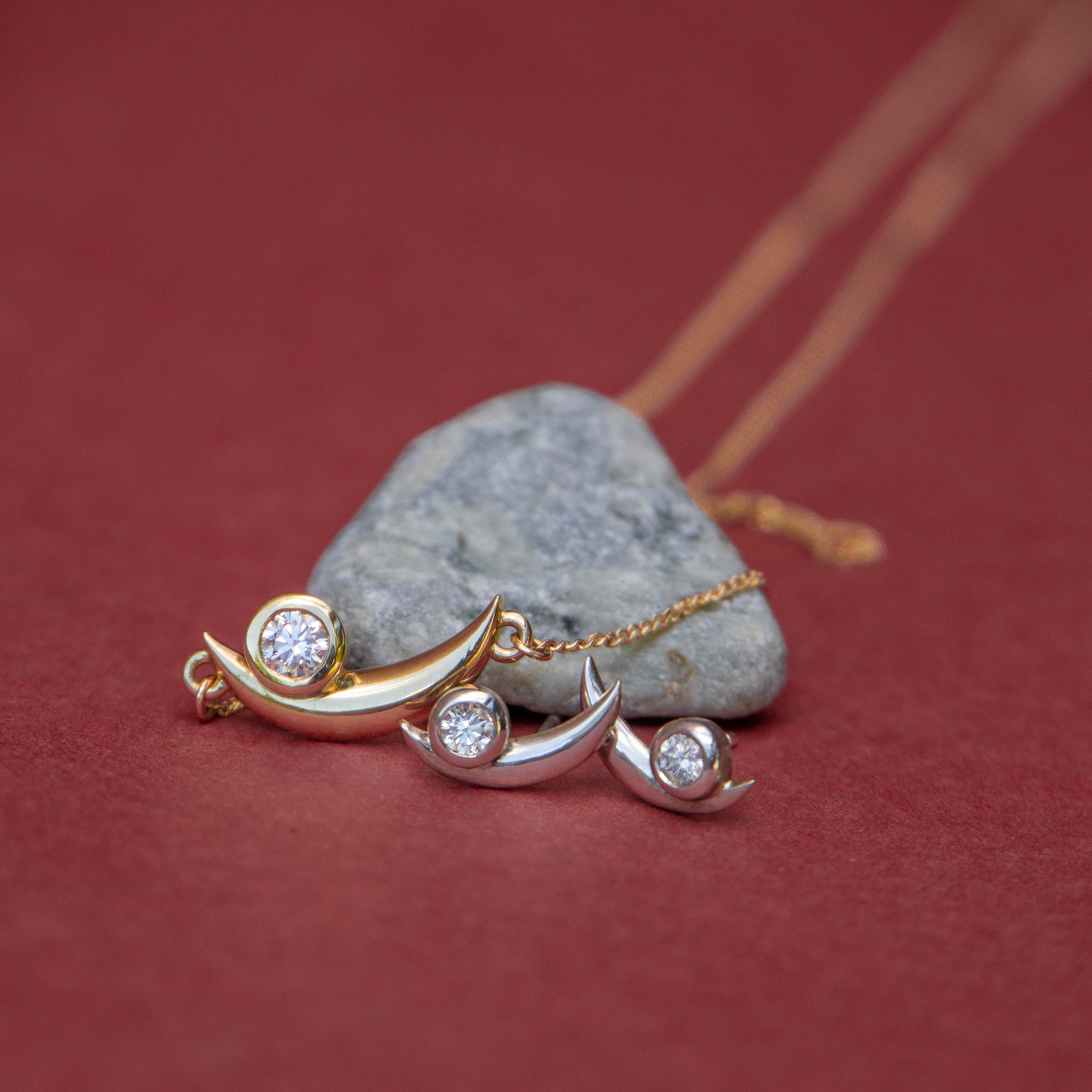 crescent gold diamond earrings and necklace set