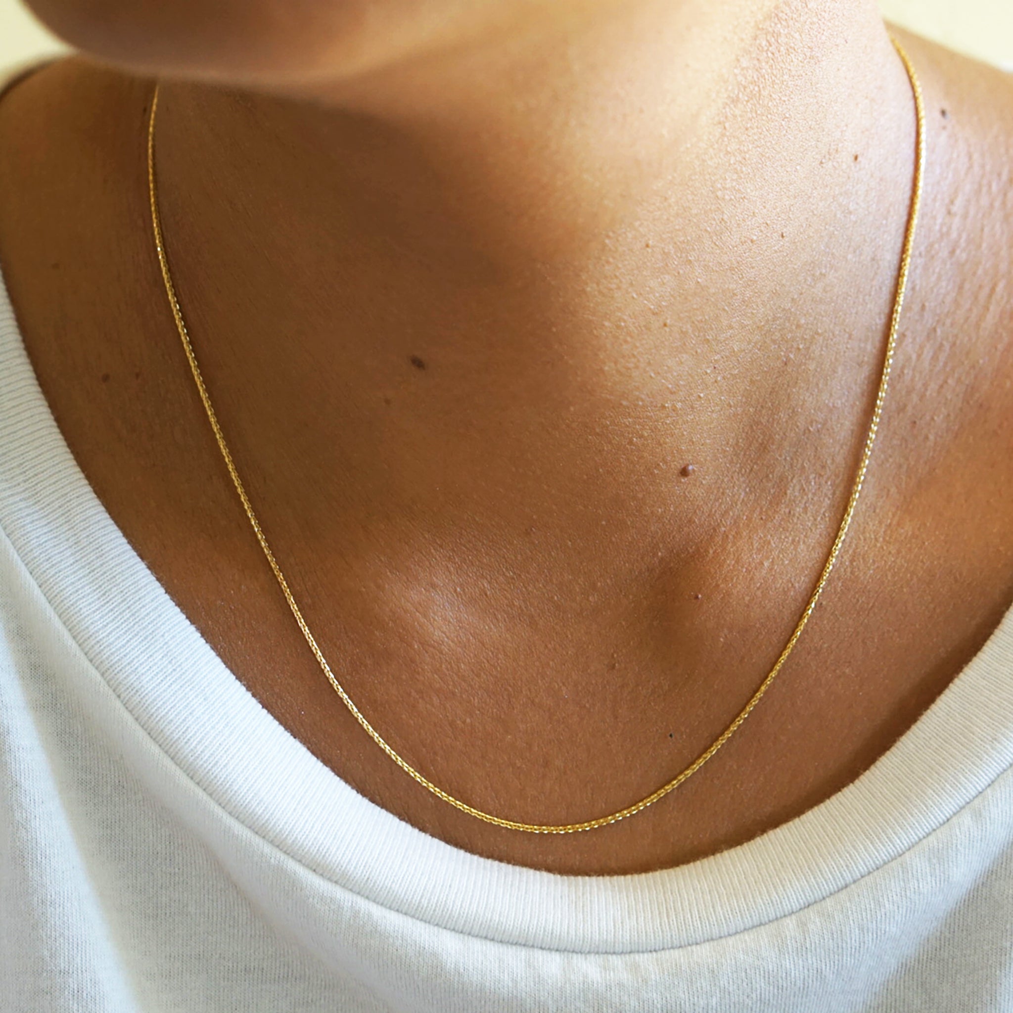 Yellow gold fine wheat chain by AïANA