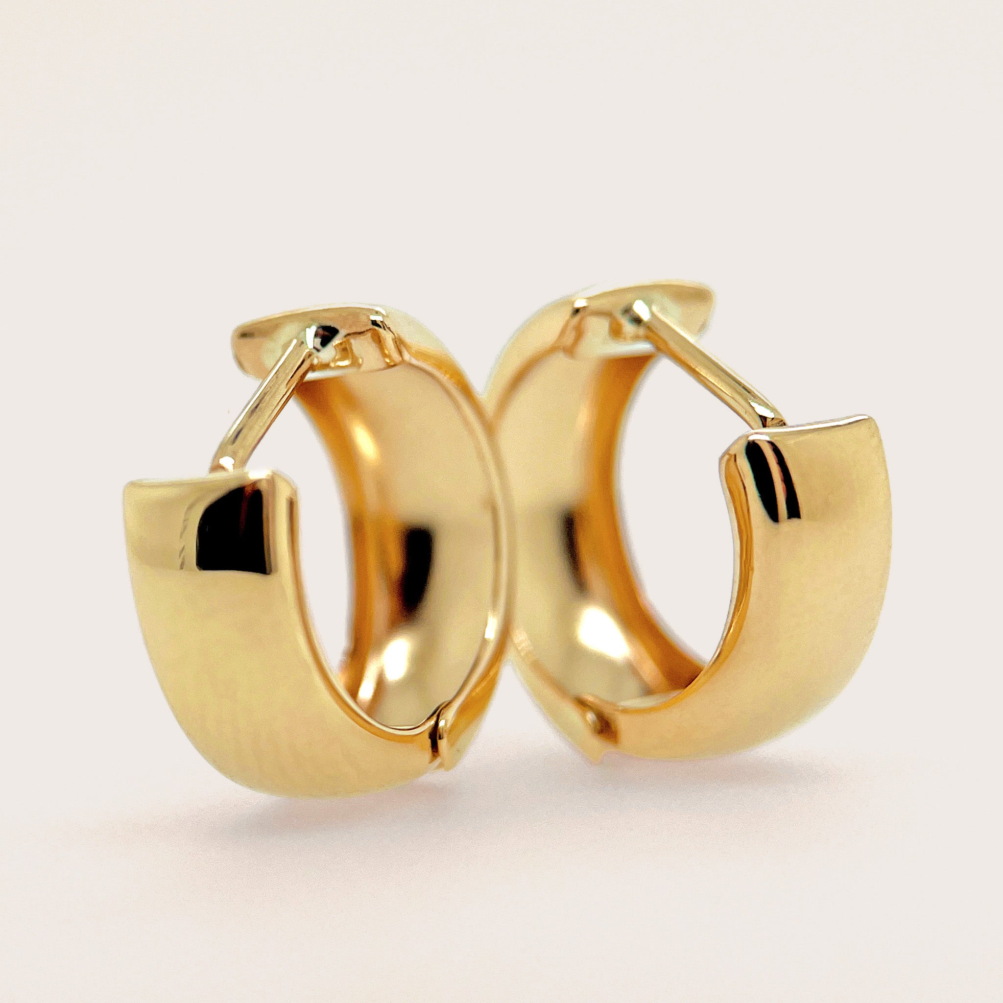 thick wide bold huggie hoop earrings in solid gold australia