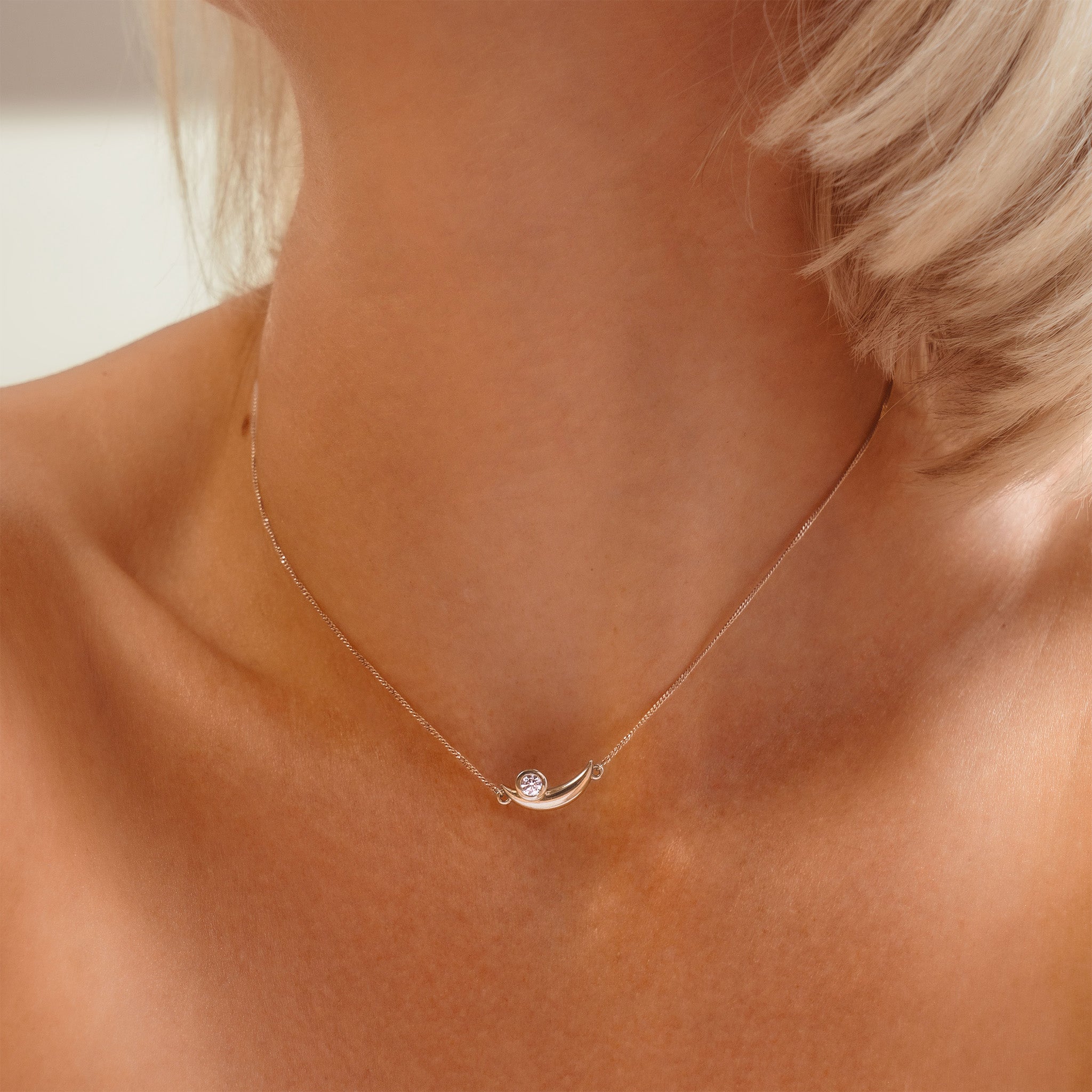 solid white gold crescent necklace with diamond on neck - AIANA jewellery Australia