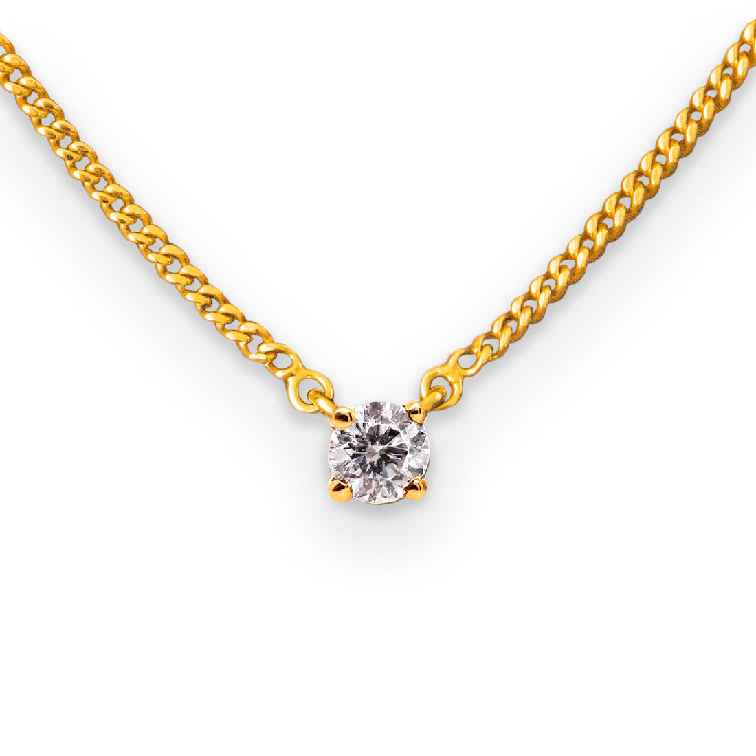 0.25ct diamond prong set solid gold pendant on diamond cut curb chain