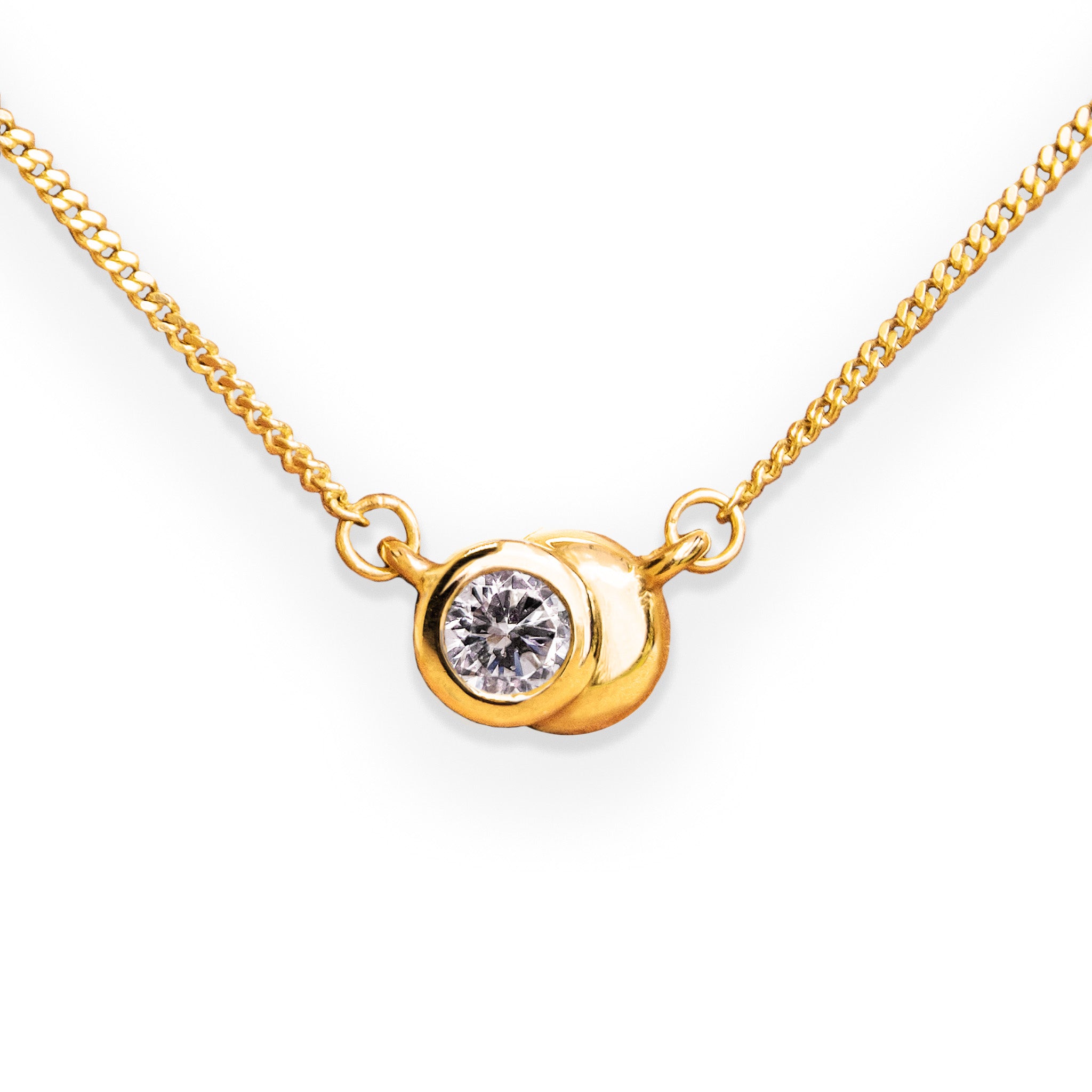 solid gold dome bezel set diamond pendant with diamond cut curb chain