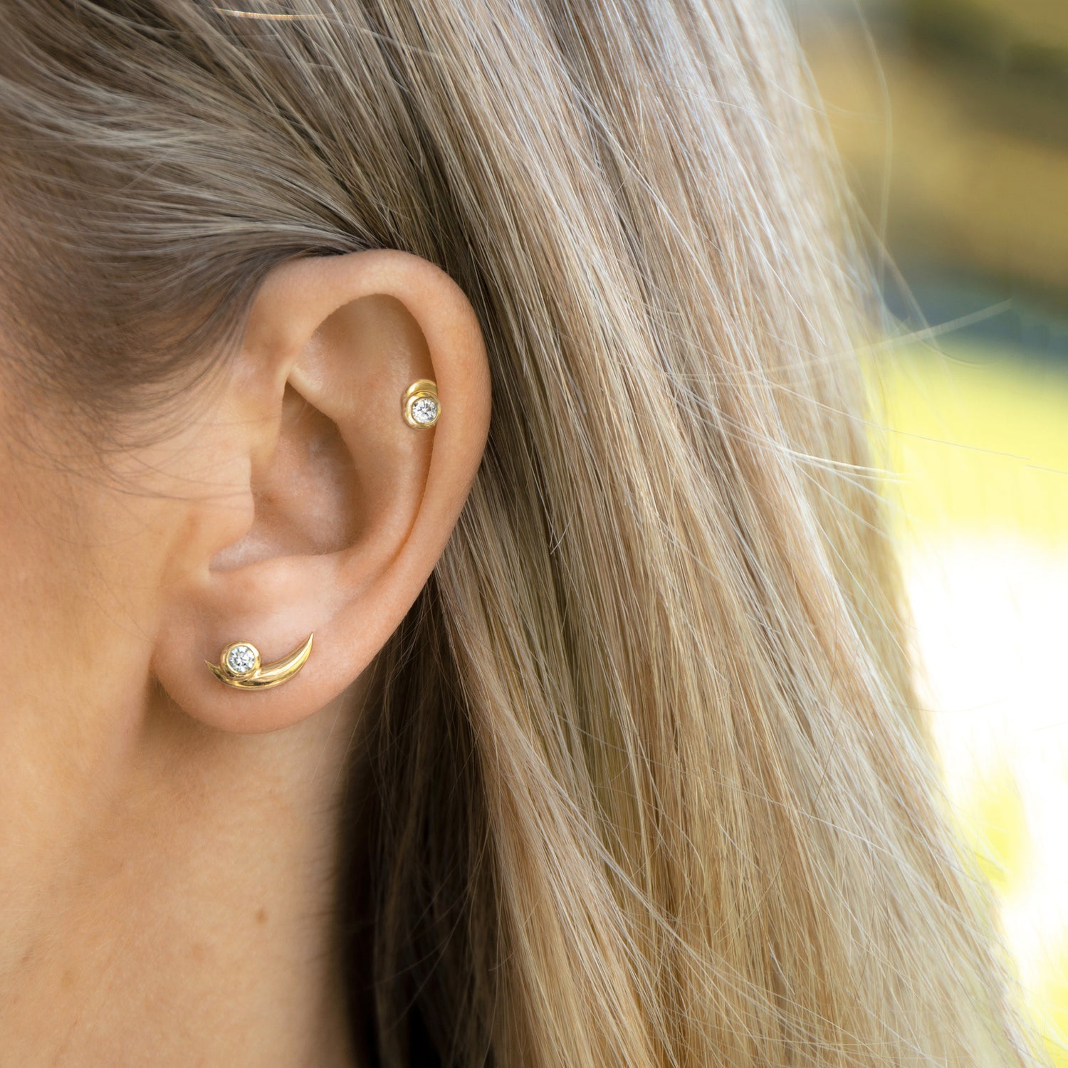 solid gold lab diamond earrings on lobe and helix