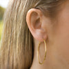 Fine Hoop Yellow Gold on ear - AïANA