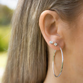 White gold earring stack on ear - AïANA