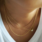 Solid gold layered necklaces by AïANA